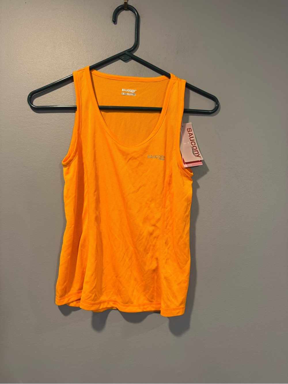 *Saucony Women’s Bright Orange Training Tank